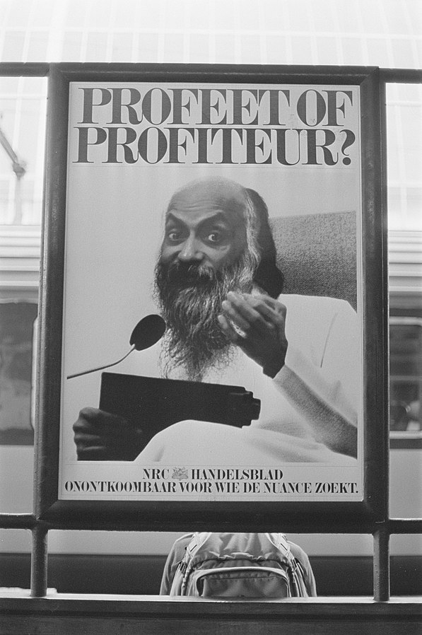 Poster with Rajneesh (later known as Osho) with the text "prophet or profiteer?".