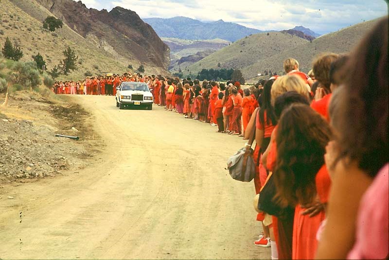 Rajneesh driving one of his Rolls-Royce in Rajneeshpuram.