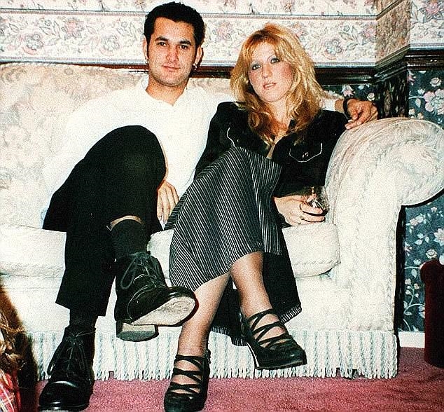 Lee Harvey and Tracie Andrews in a sofa.